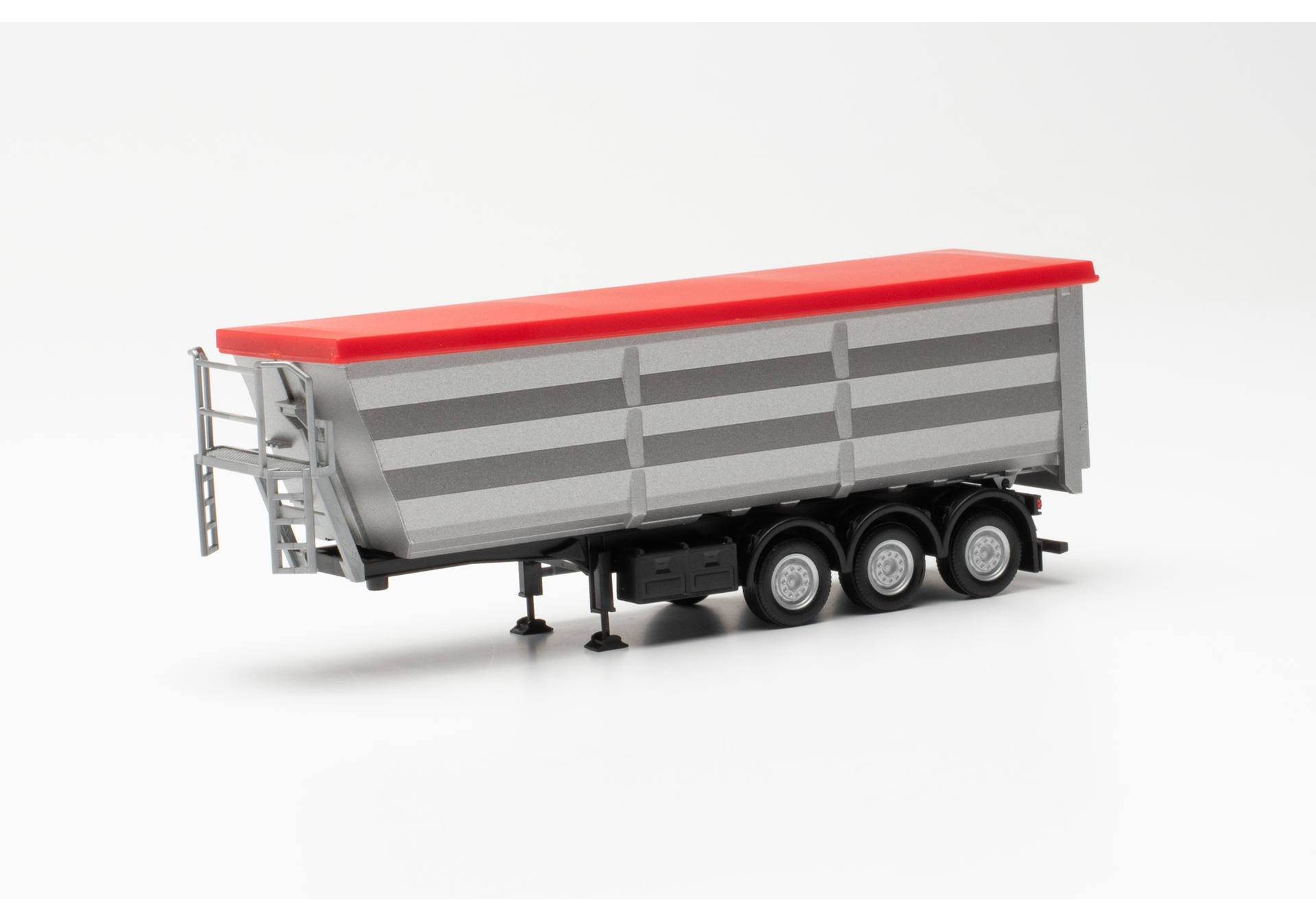 Steel dump trailer, silver with red tarp